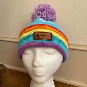 Rainbow Locale Outdoor brand winter hat. Angel Fire resort patch on front.